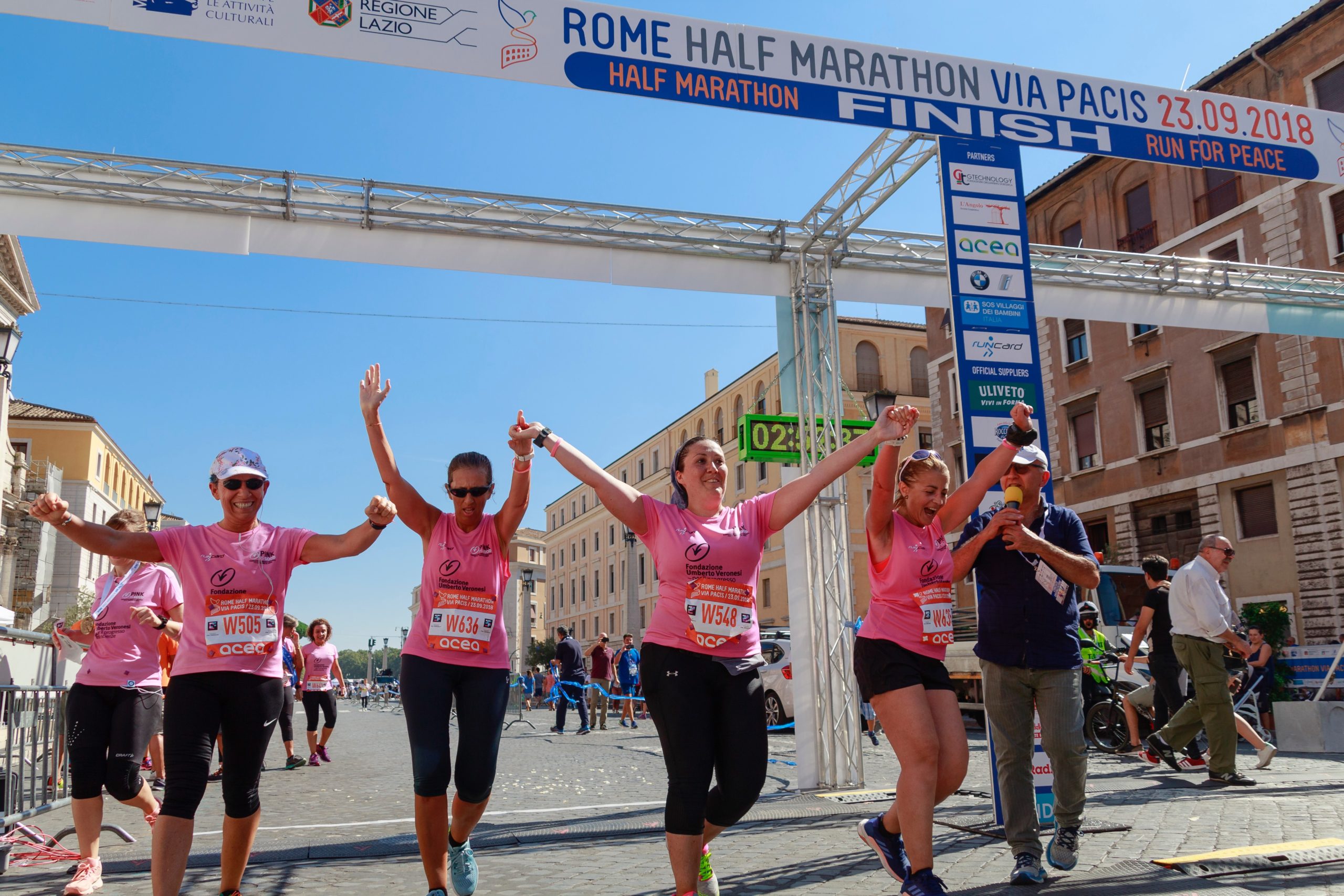 Women celebrating Breast Cancer Awareness Month