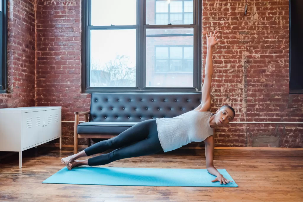 Woman is doing a plank exercise.