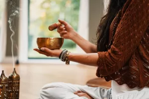 Woman with a serving bowl.