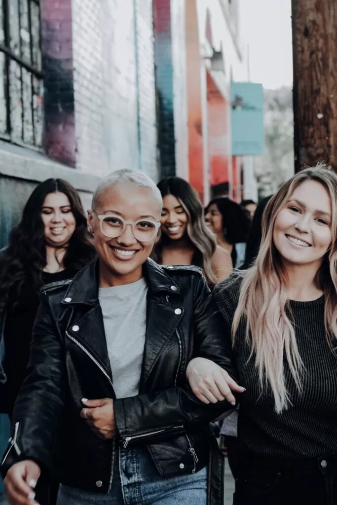 A group of women smiling.