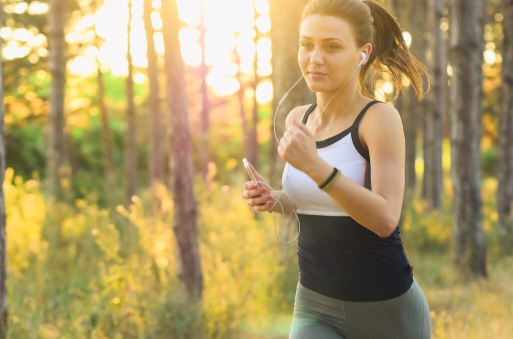 A woman practicing physiology by jogging.