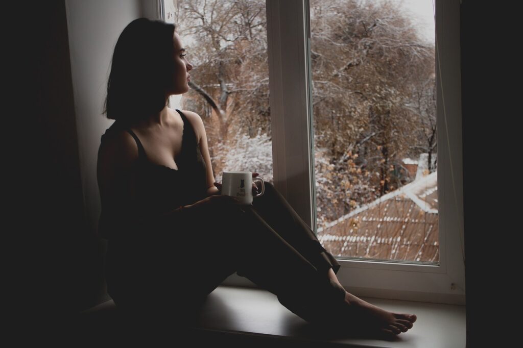 A girl staring out the window.