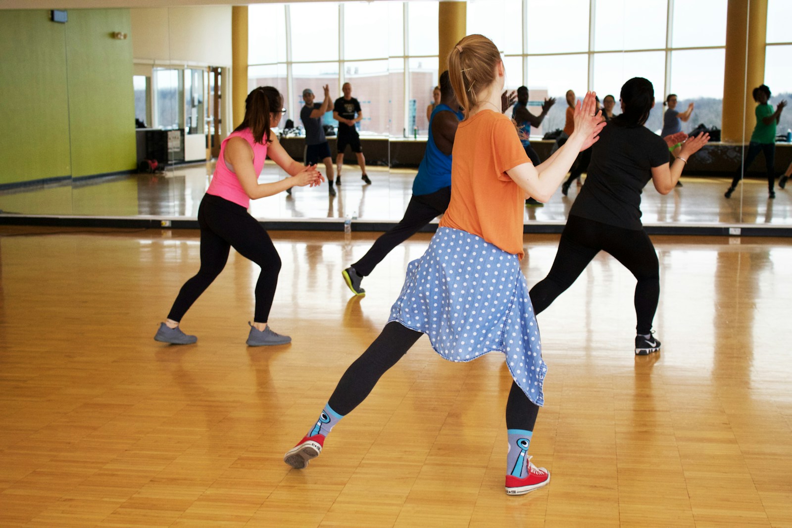 women dancing and enjoying a morning exercise program together