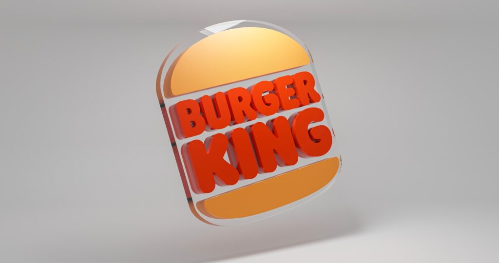 a burger king logo is shown on a gray background